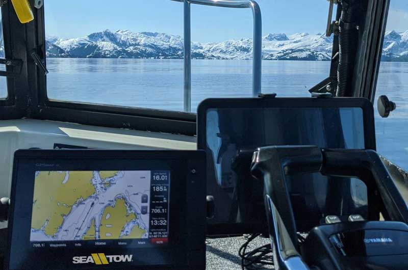 Sea tow boat helping researchers in addition to other boat towing services.