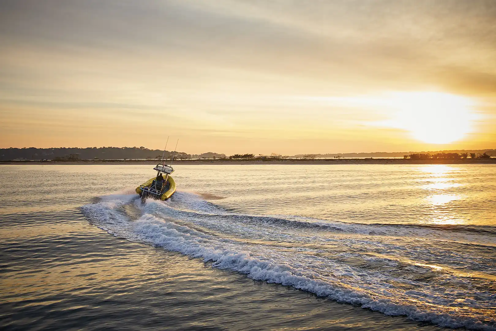 Sea Tow boat patrolling Long Island Sound at sunset