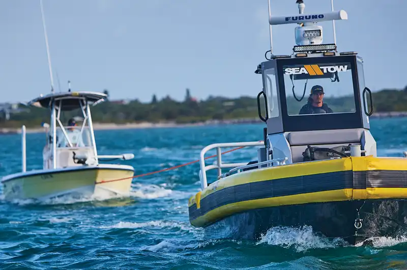 Sea Tow towing member to safety.